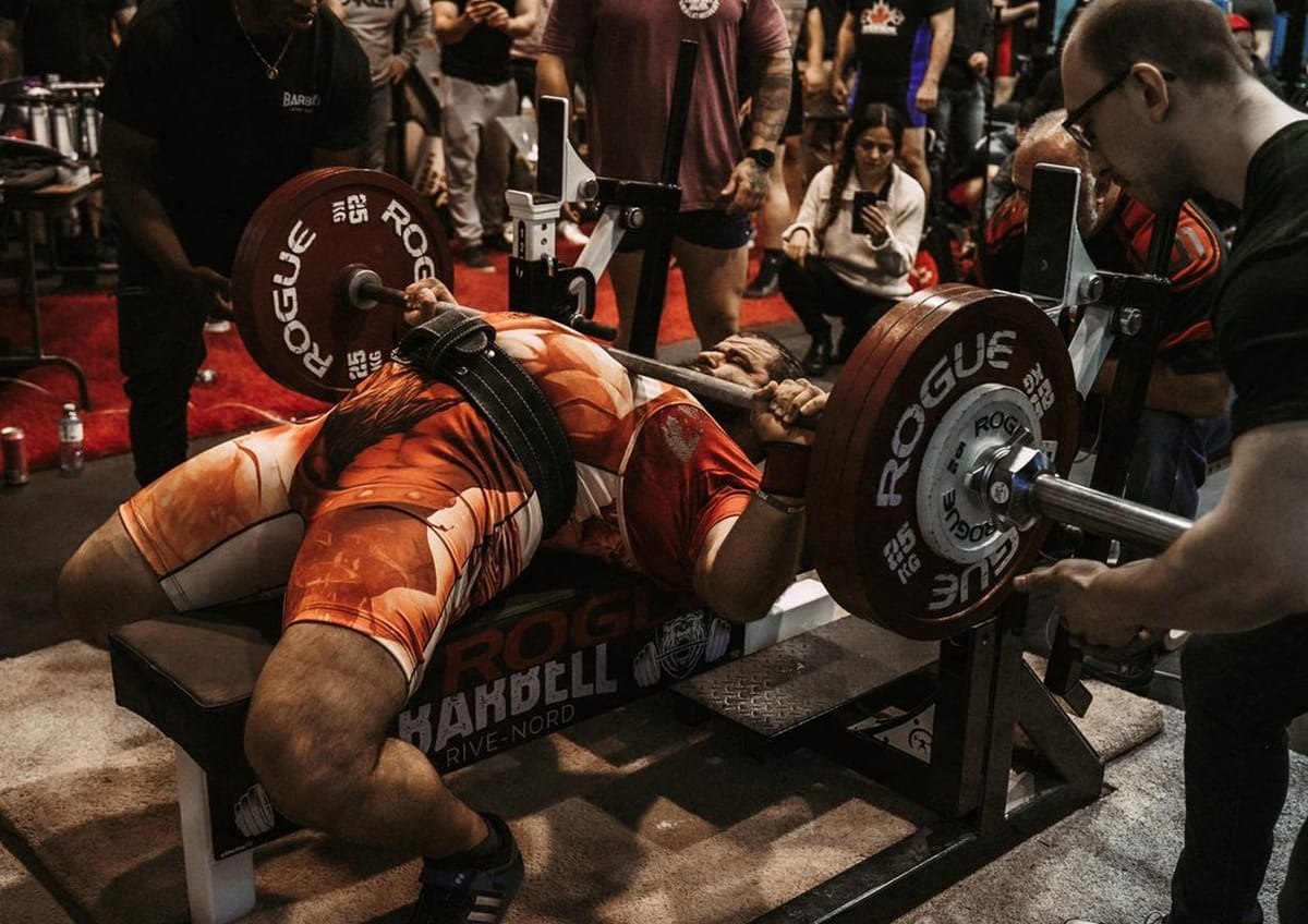 Heavy bench press at powerlifting competition