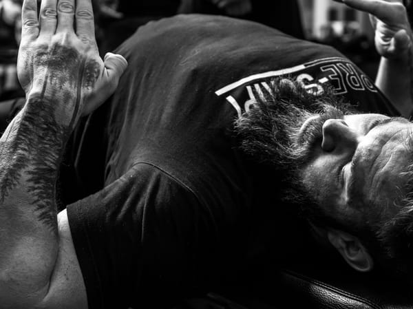 Jordan Shallow demonstrating a bench press.